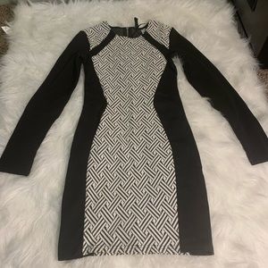 Black and white fitted knee length dress